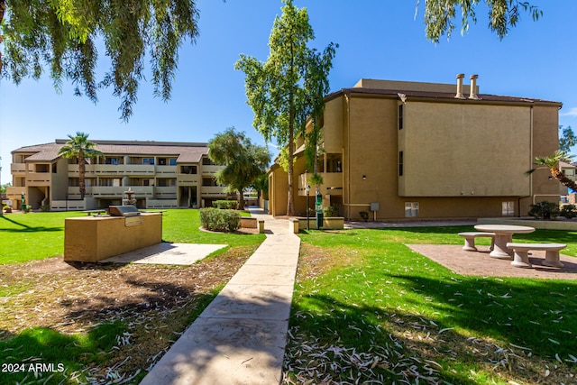 surrounding community featuring a yard