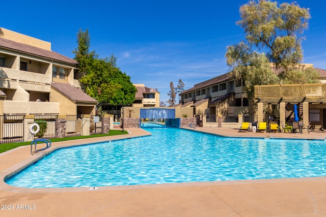 view of swimming pool featuring a patio