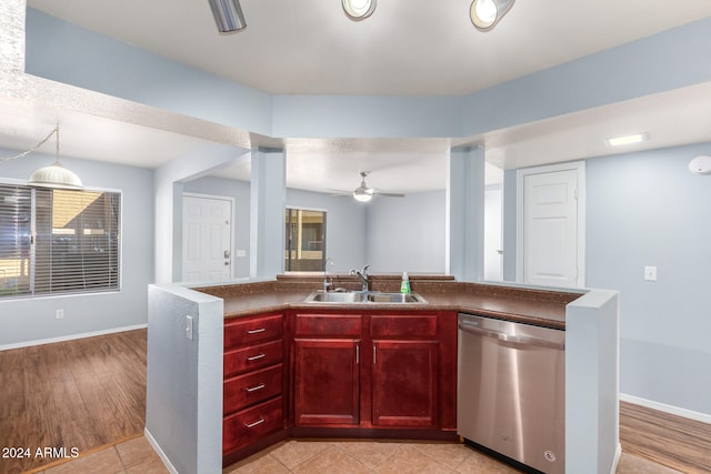 kitchen with sink, dishwasher, light hardwood / wood-style floors, and ceiling fan