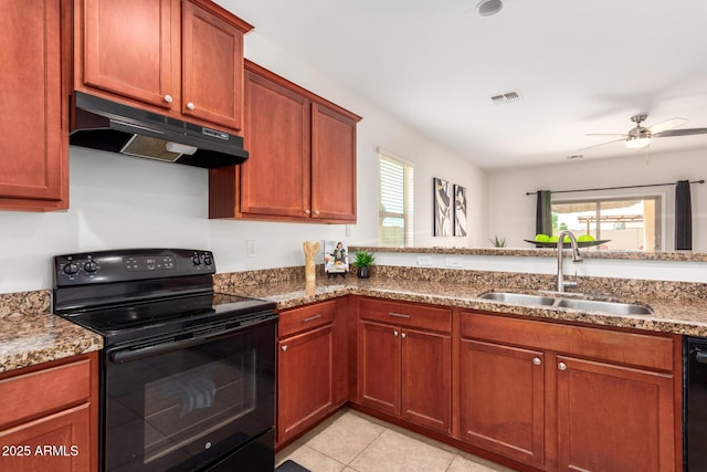 7324 S 254th Dr, Buckeye, AZ 85326 - kitchen with black appliances, under cabinet range hood, a sink, stone countertops, and ceiling fan