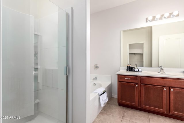 7324 S 254th Dr, Buckeye, AZ 85326 - bathroom featuring a stall shower, vanity, a bath, and tile patterned flooring