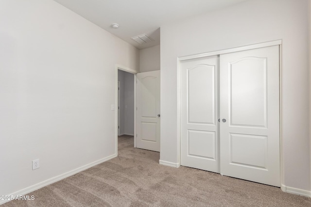 7324 S 254th Dr, Buckeye, AZ 85326 - unfurnished bedroom featuring carpet floors, a closet, and baseboards