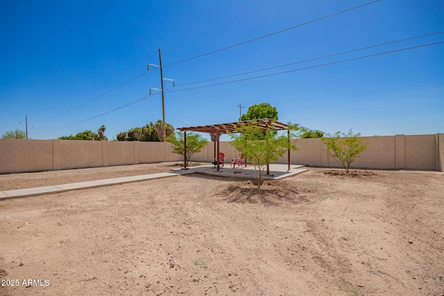 7324 S 254th Dr, Buckeye, AZ 85326 - fenced backyard with a pergola and a patio area