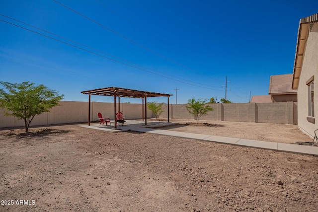 7324 S 254th Dr, Buckeye, AZ 85326 - fenced backyard with a pergola and a patio area