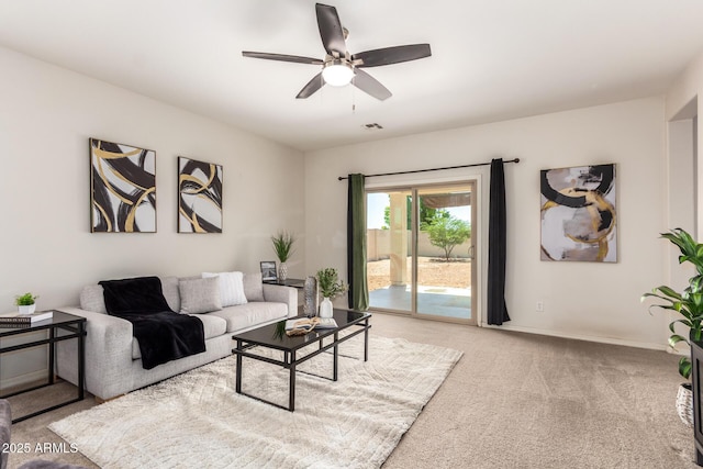 7324 S 254th Dr, Buckeye, AZ 85326 - carpeted living area featuring ceiling fan and baseboards