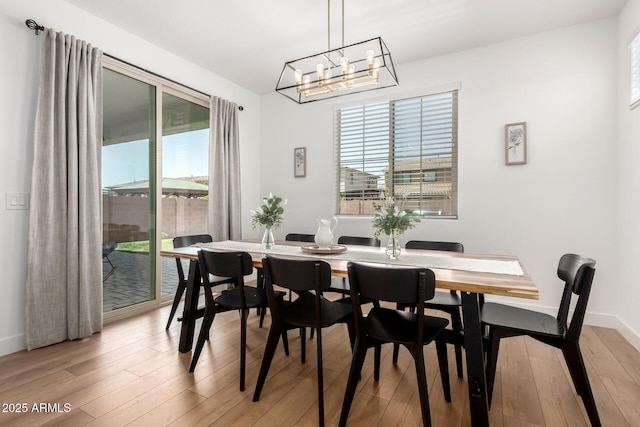 10956 E Thunderbolt Ave, Mesa, AZ 85212 - dining area with plenty of natural light, a chandelier, and light wood-style flooring