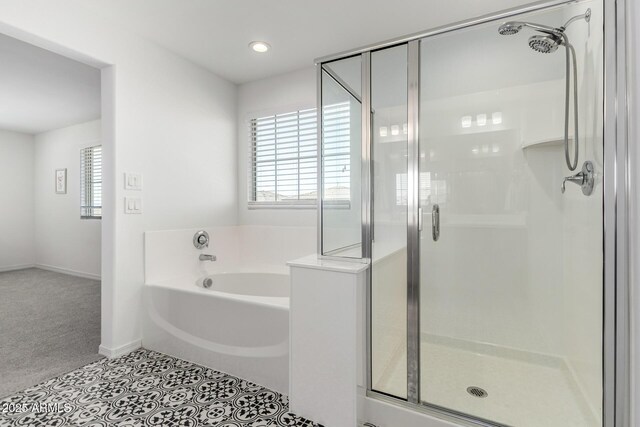 10956 E Thunderbolt Ave, Mesa, AZ 85212 - bathroom with a stall shower, a bath, baseboards, and recessed lighting