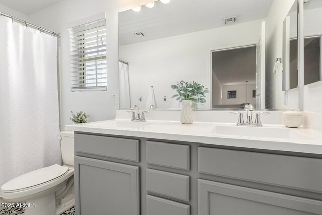 10956 E Thunderbolt Ave, Mesa, AZ 85212 - bathroom with toilet and double vanity