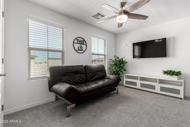 10956 E Thunderbolt Ave, Mesa, AZ 85212 - carpeted living room with ceiling fan and baseboards