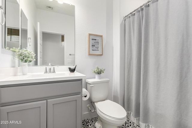 10956 E Thunderbolt Ave, Mesa, AZ 85212 - bathroom featuring toilet, vanity, tile patterned floors, and curtained shower