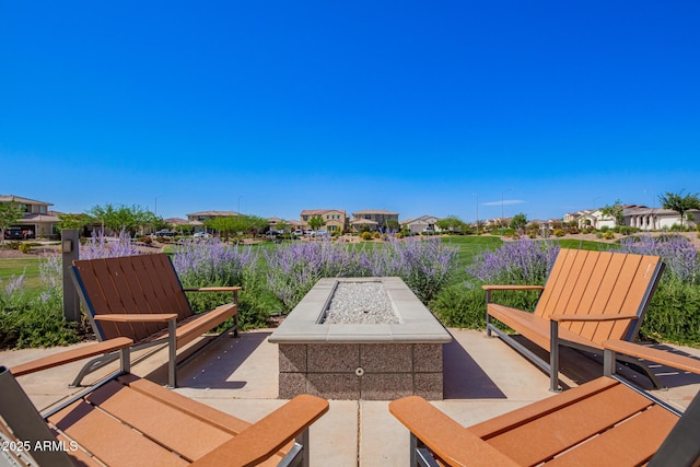 10956 E Thunderbolt Ave, Mesa, AZ 85212 - view of patio with a fire pit and a residential view