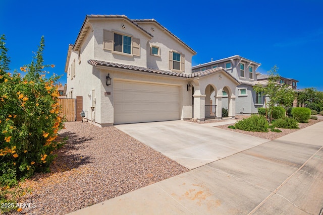 10956 E Thunderbolt Ave, Mesa, AZ 85212 - mediterranean / spanish house featuring a tile roof, stucco siding, an attached garage, and driveway