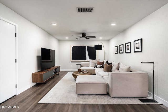 8341 E Hubbell St, Scottsdale, AZ 85257 - living area with ceiling fan, recessed lighting, dark wood-style flooring, and baseboards