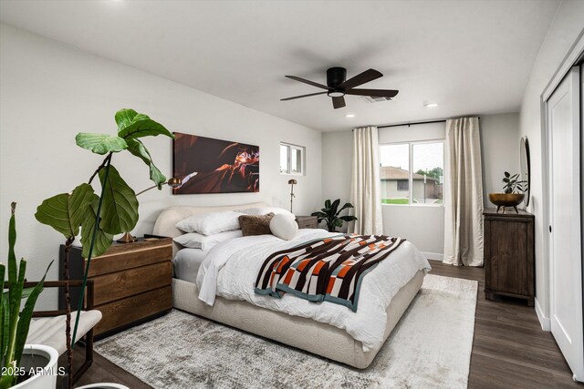 8341 E Hubbell St, Scottsdale, AZ 85257 - bedroom featuring dark wood-type flooring, baseboards, recessed lighting, and a ceiling fan
