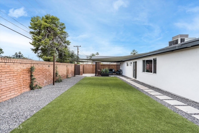8341 E Hubbell St, Scottsdale, AZ 85257 - view of yard featuring cooling unit and a patio area