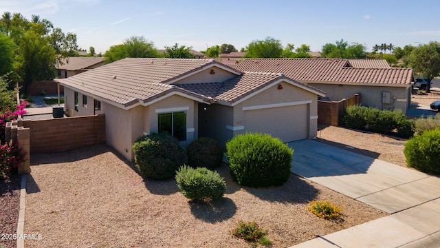 13170 W Clarendon Ave, Litchfield Park, AZ 85340 - single story home featuring stucco siding, an attached garage, concrete driveway, and a tile roof