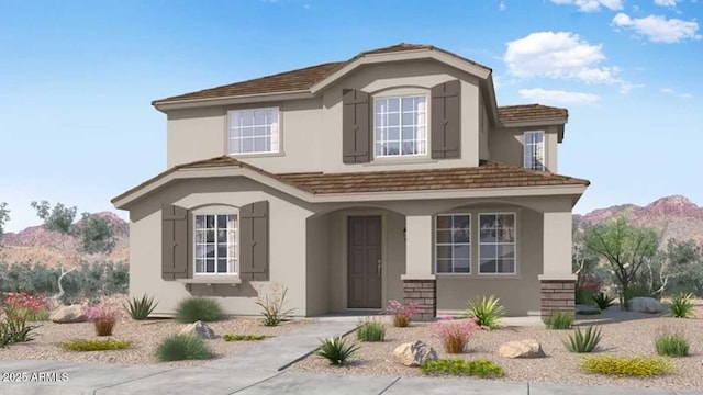 view of front of home with a mountain view