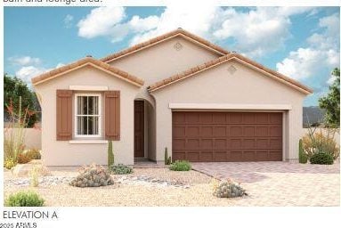 mediterranean / spanish-style home featuring a garage