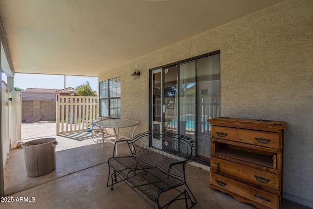 view of patio with fence