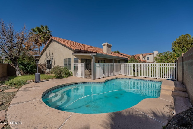 view of pool featuring a fenced in pool and a fenced backyard