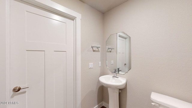 bathroom featuring toilet