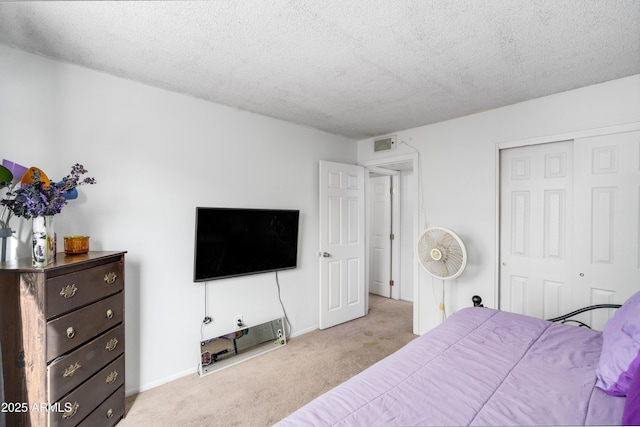1032 E Redfield Rd, Tempe, AZ 85283 - bedroom with carpet floors, a textured ceiling, and a closet