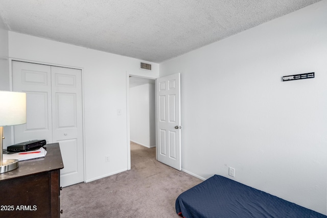 1032 E Redfield Rd, Tempe, AZ 85283 - unfurnished bedroom with carpet floors, a textured ceiling, and a closet