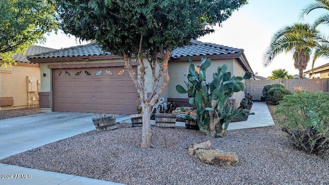 view of side of property with a garage