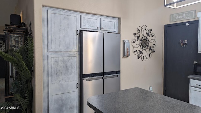 kitchen featuring stainless steel fridge