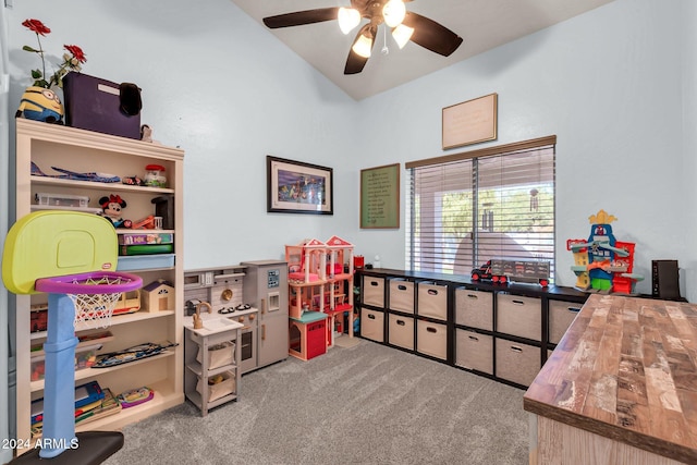 game room featuring light colored carpet and ceiling fan