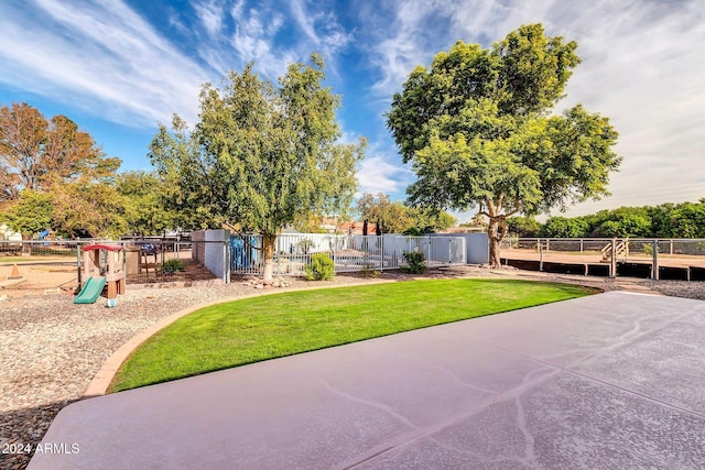 view of patio featuring a playground