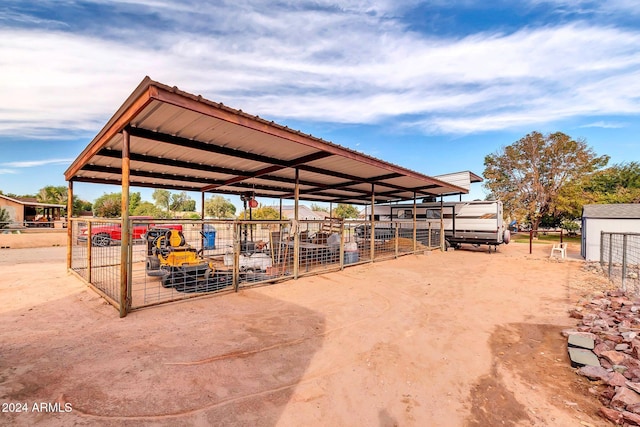 view of community featuring an outbuilding