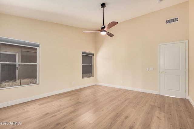 unfurnished room featuring ceiling fan and light hardwood / wood-style flooring