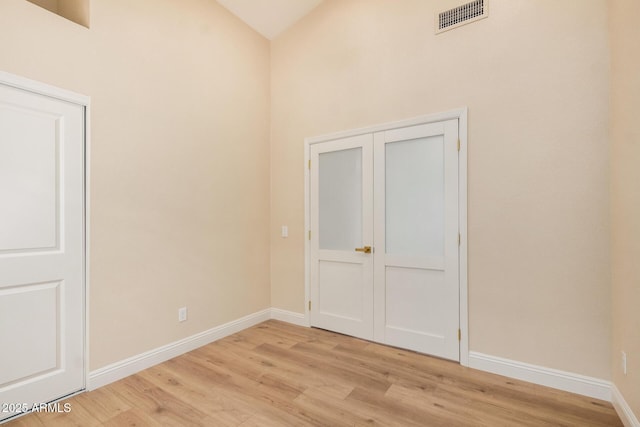 unfurnished bedroom with light hardwood / wood-style floors