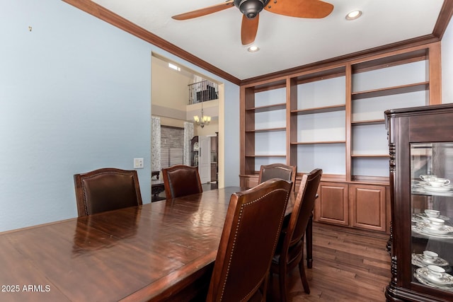 18171 W Marshall Ln, Surprise, AZ 85388 - dining room featuring recessed lighting, dark wood-style floors, ornamental molding, and ceiling fan with notable chandelier