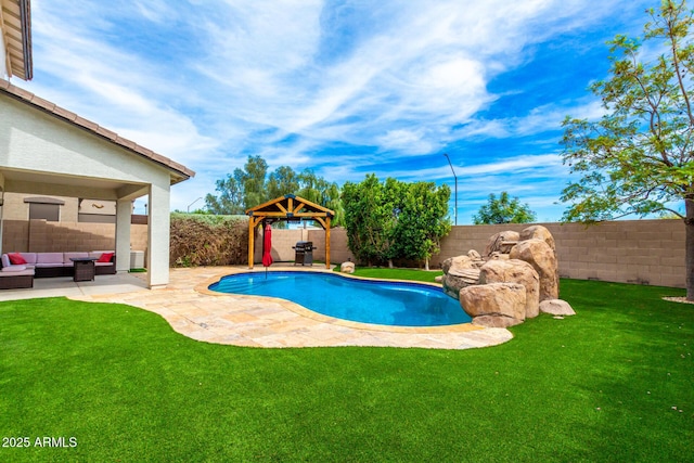 18171 W Marshall Ln, Surprise, AZ 85388 - view of pool with a fenced backyard, an outdoor hangout area, a patio area, a gazebo, and a yard