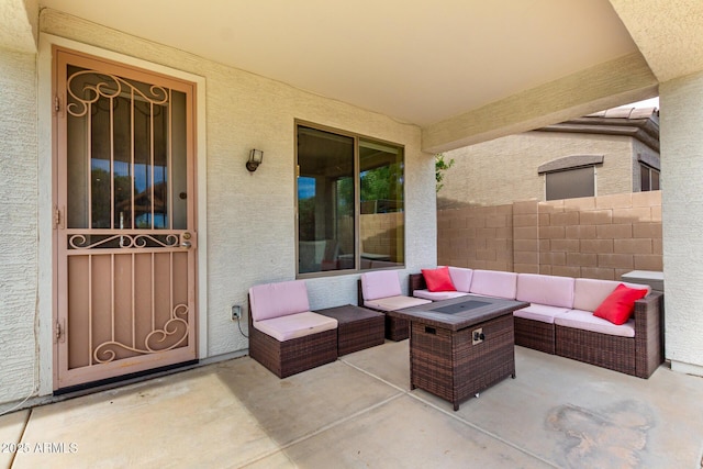 18171 W Marshall Ln, Surprise, AZ 85388 - view of patio / terrace with an outdoor living space with a fire pit and fence