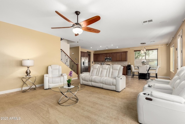 18171 W Marshall Ln, Surprise, AZ 85388 - living room featuring visible vents, light carpet, baseboards, recessed lighting, and a ceiling fan