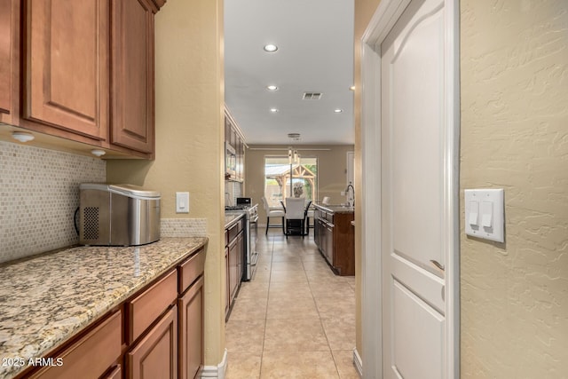18171 W Marshall Ln, Surprise, AZ 85388 - hallway featuring recessed lighting, a textured wall, and light tile patterned floors