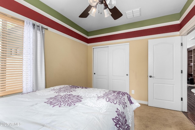 18171 W Marshall Ln, Surprise, AZ 85388 - carpeted bedroom with ceiling fan, visible vents, baseboards, and a closet