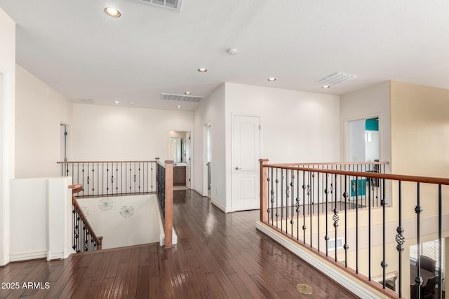 18171 W Marshall Ln, Surprise, AZ 85388 - hallway featuring recessed lighting, visible vents, hardwood / wood-style flooring, and an upstairs landing