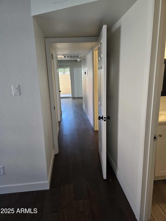 hall featuring dark hardwood / wood-style floors