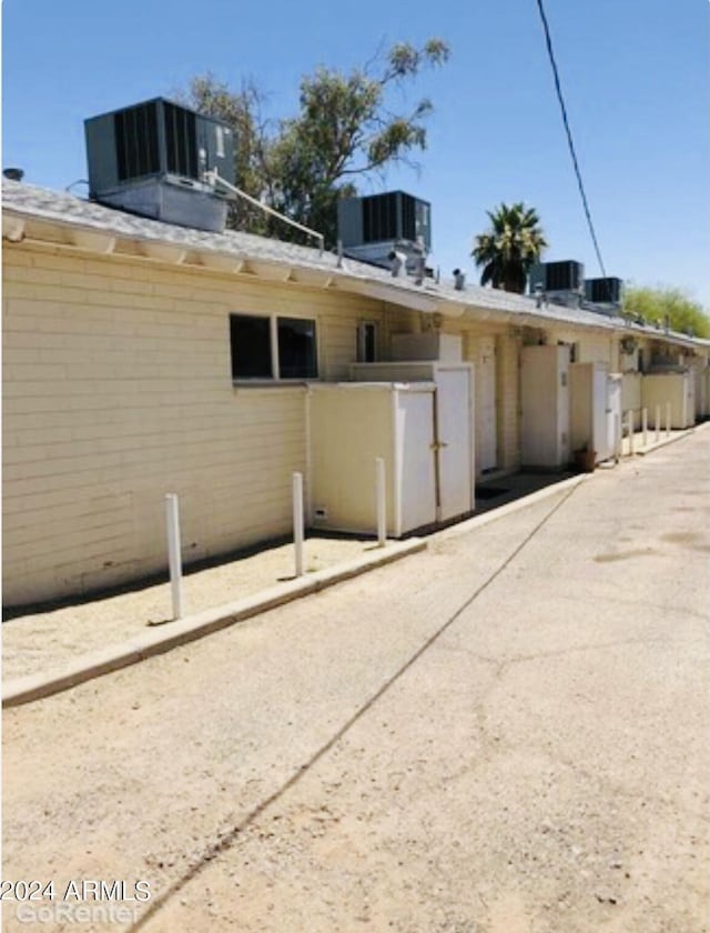 view of property exterior with cooling unit