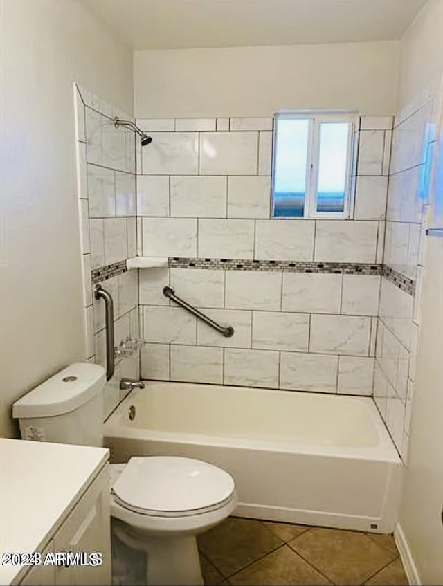 bathroom with vanity, tile patterned flooring, bathtub / shower combination, and toilet