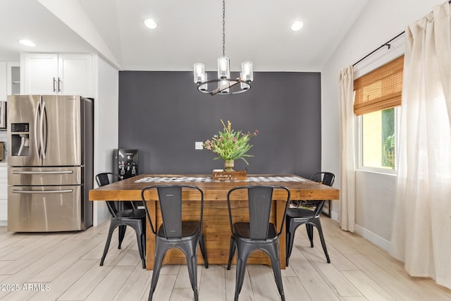 dining area with wood tiled floor, a chandelier, baseboards, and recessed lighting