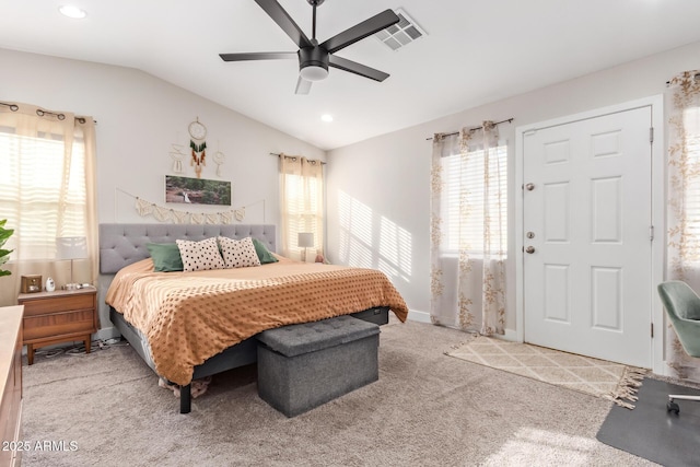 carpeted bedroom featuring lofted ceiling, ceiling fan, recessed lighting, visible vents, and baseboards