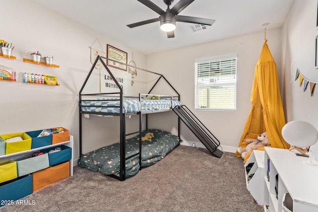 bedroom featuring carpet floors, visible vents, and a ceiling fan