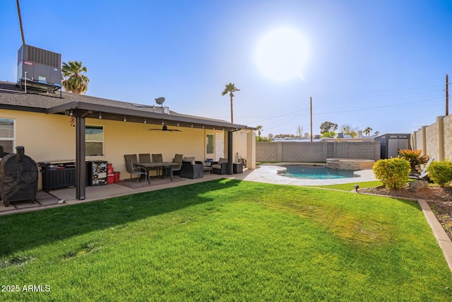 view of yard featuring a patio, cooling unit, a fenced backyard, and a ceiling fan