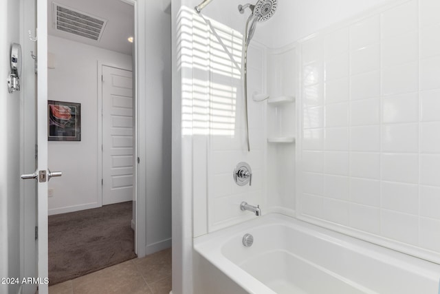 bathroom featuring tile patterned floors and shower / bathing tub combination