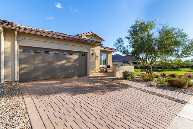 exterior space featuring a garage